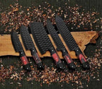 Complete black hammered chef knife set arranged together