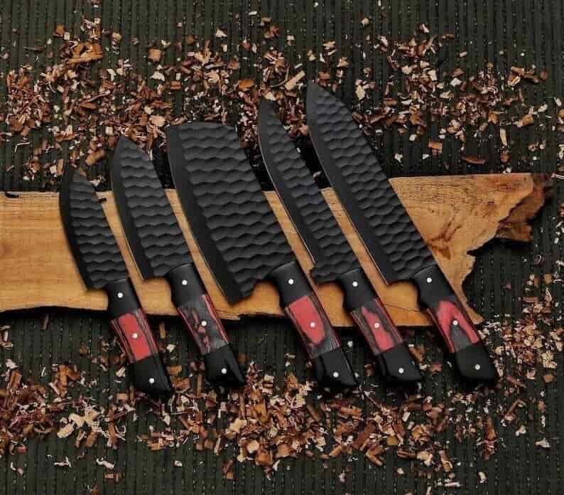 Complete black hammered chef knife set arranged together