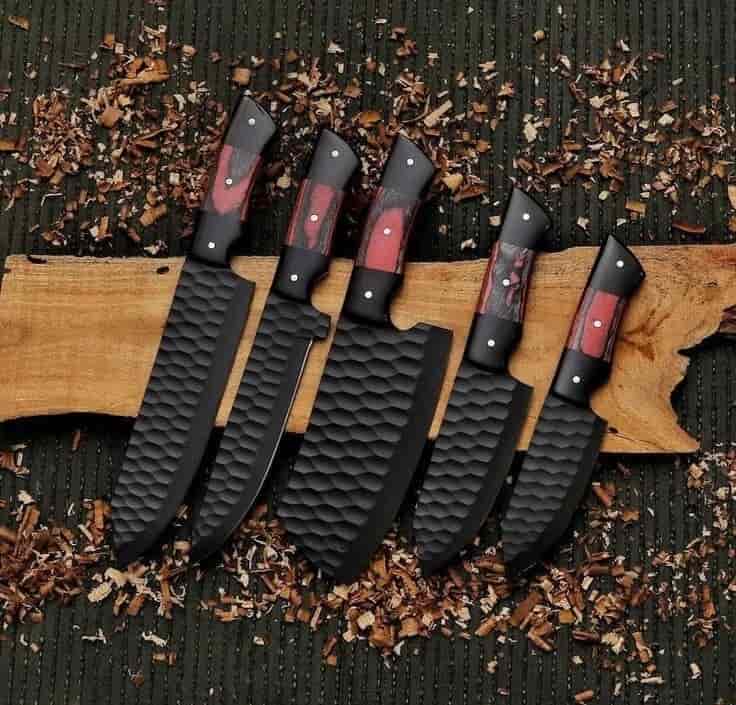 Black hammered kitchen blades with red-black handles