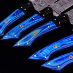 Mosaic pin details on blue wood chef knife handles