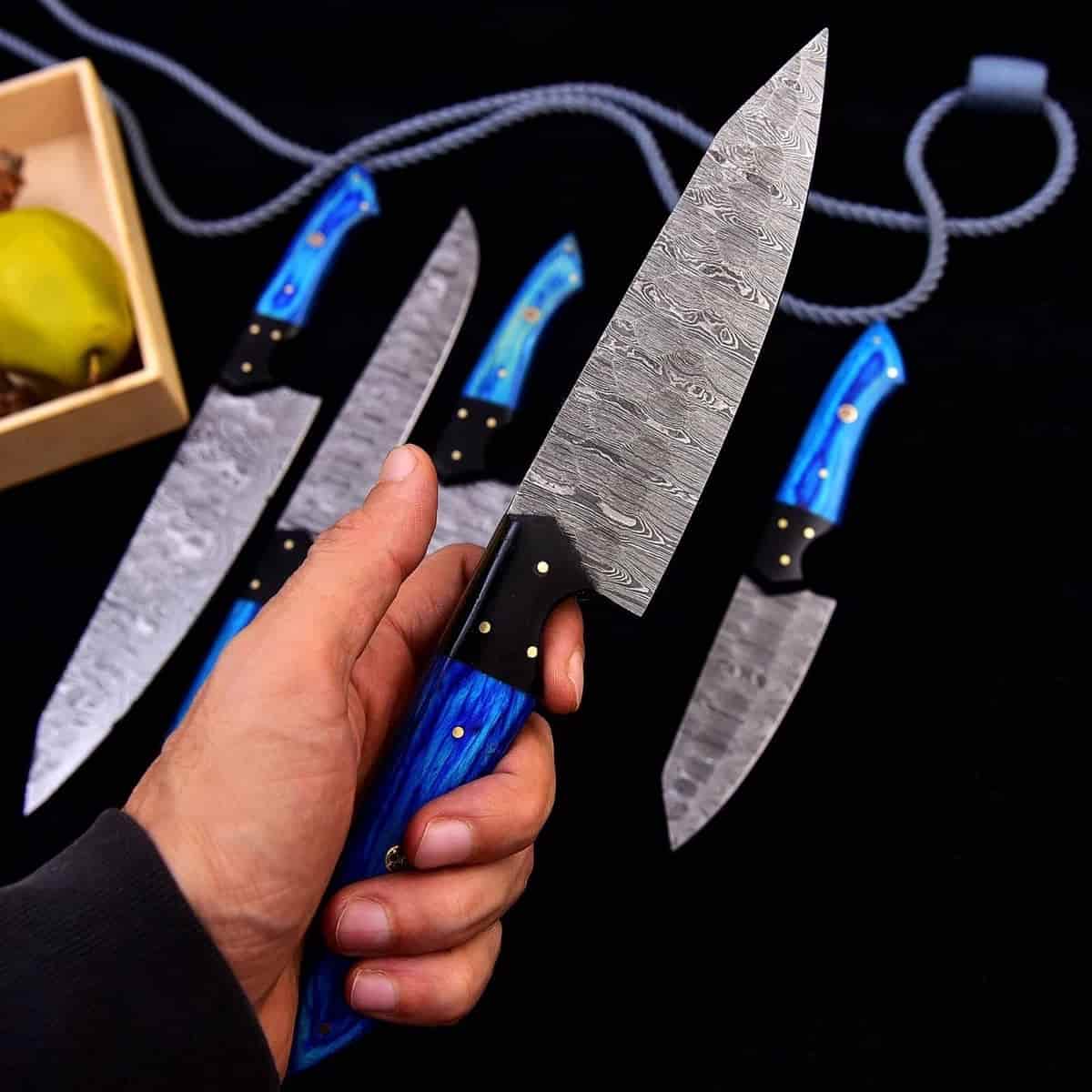 Five culinary blade profiles in the blue Damascus set