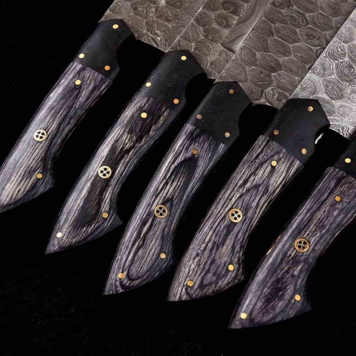 Charcoal wood handles with patterned Damascus blades