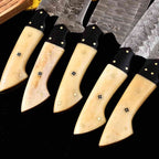 Cream-tone handles and patterned Damascus blades