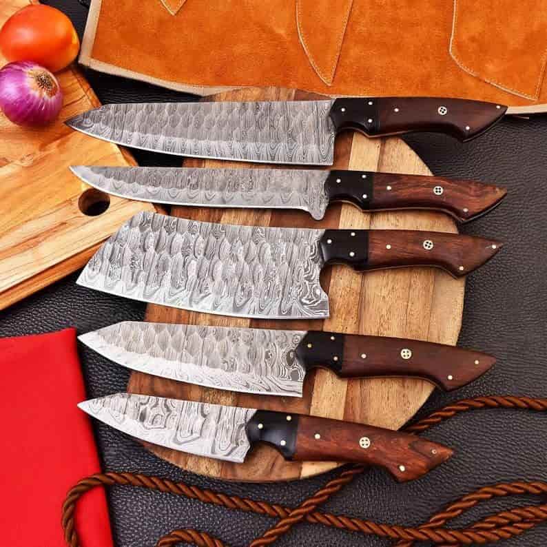 Five culinary blade profiles in the dark wood Damascus set