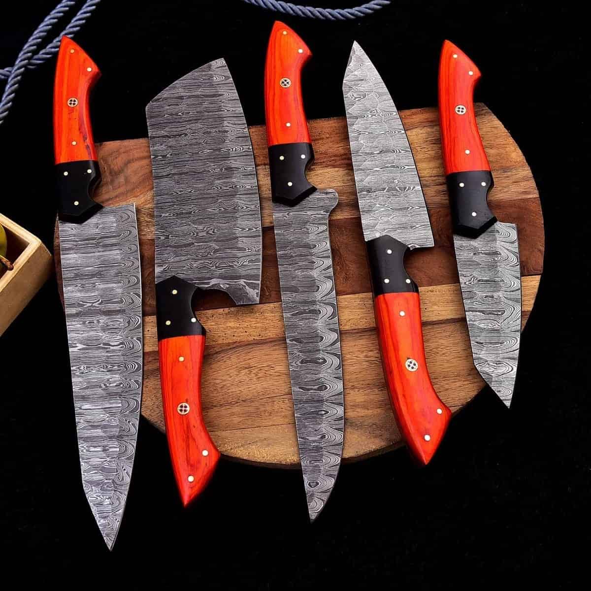 Five culinary blade profiles with ember wood handles