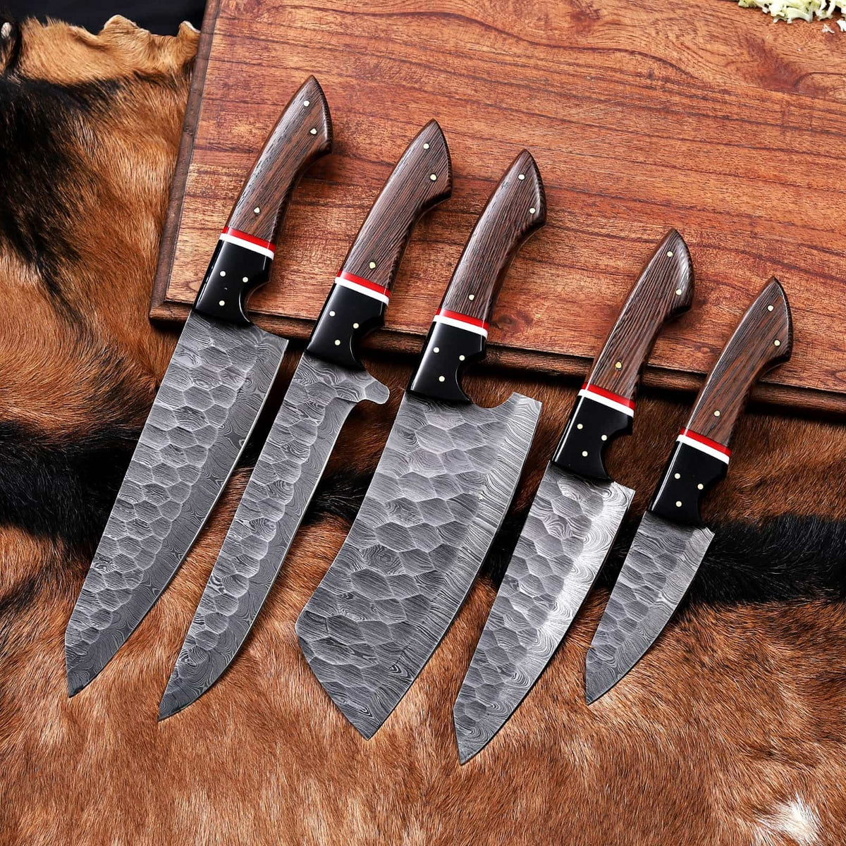 Red spacer and decorative pin details on chef knife handles