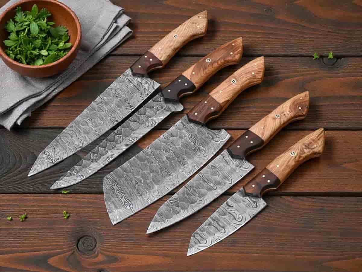 Leather roll with handmade Damascus chef knives