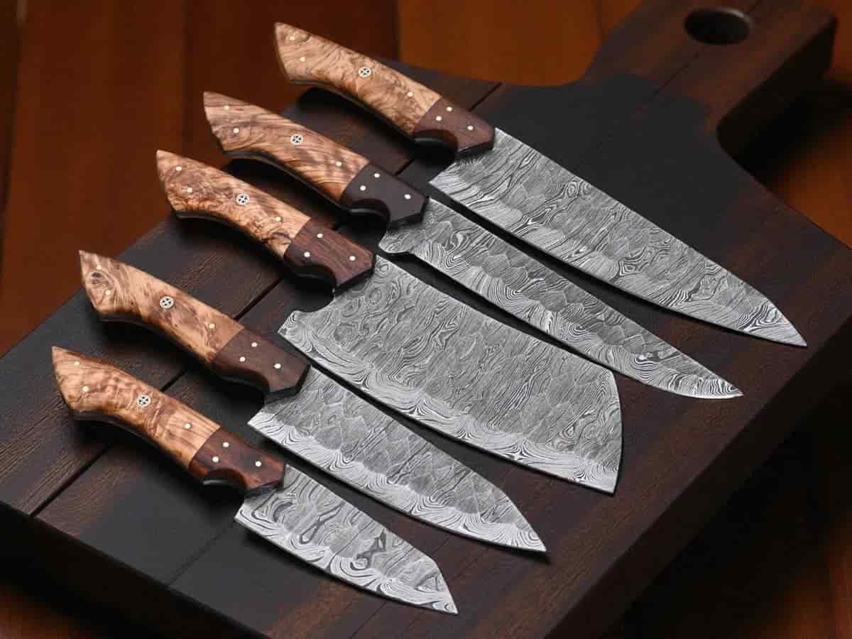 Five culinary blade profiles with natural wood handles