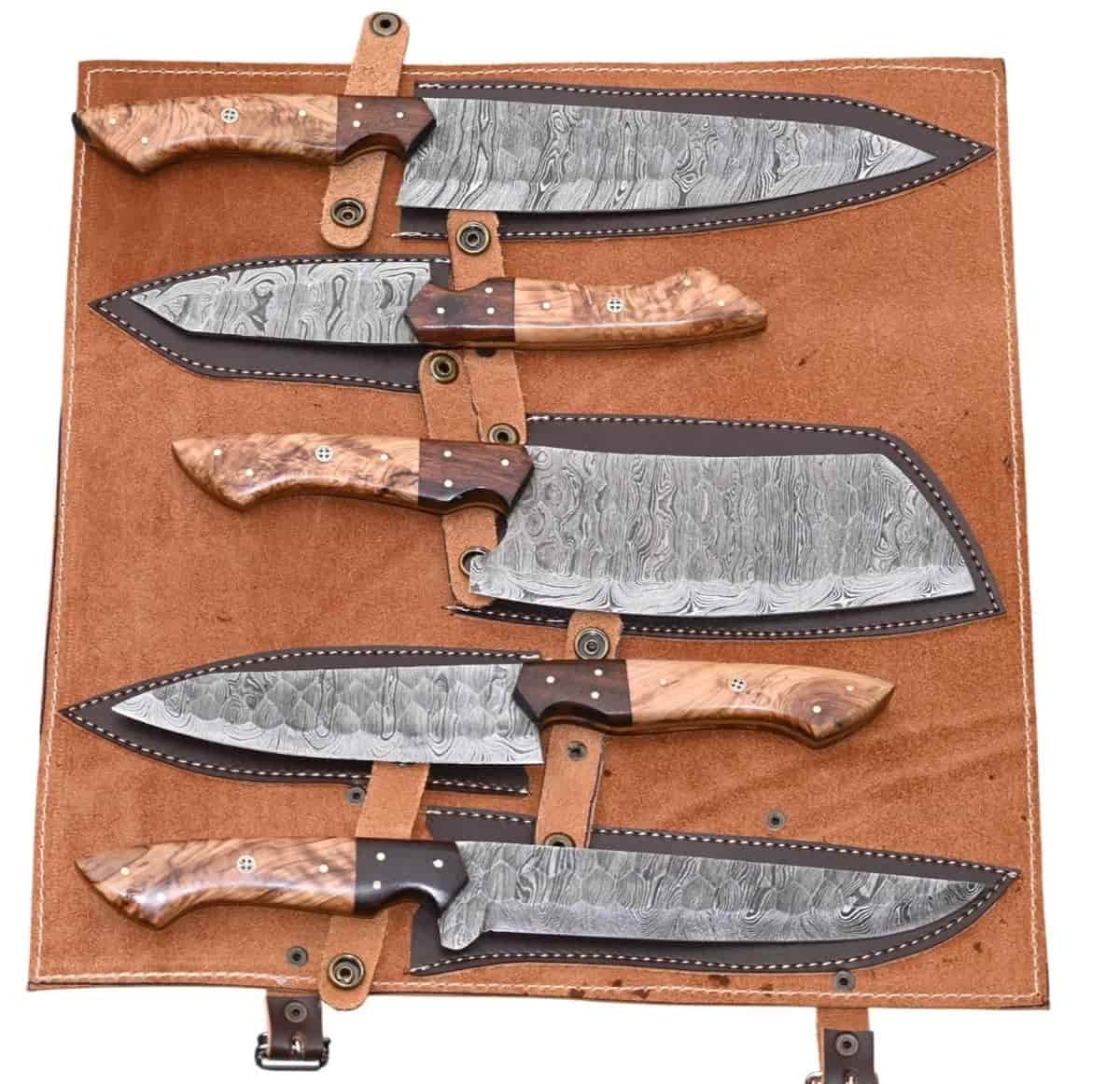 Decorative pin details on natural wood chef knife handles