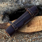 Olive-tone wood handles and patterned Damascus blades