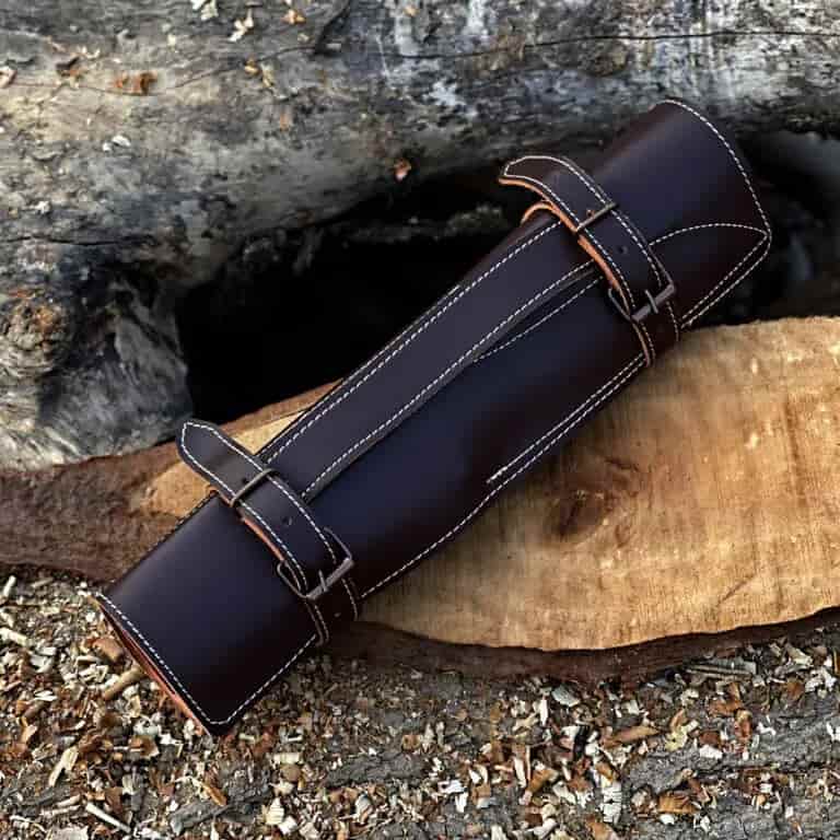 Olive-tone wood handles and patterned Damascus blades