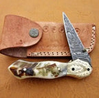 handmade Damascus folding knife with ram horn brass and mosaic pin handle – view 1