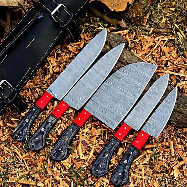 Layered-pattern blades with red bolsters and dark handles