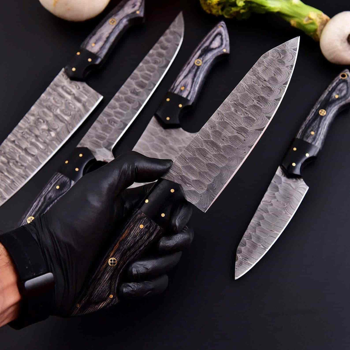 Decorative mosaic pins on smoky gray chef knife handles