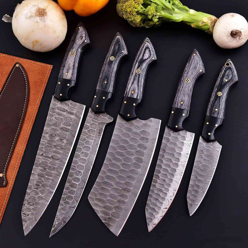 Five culinary blade profiles in the smoky gray Damascus set