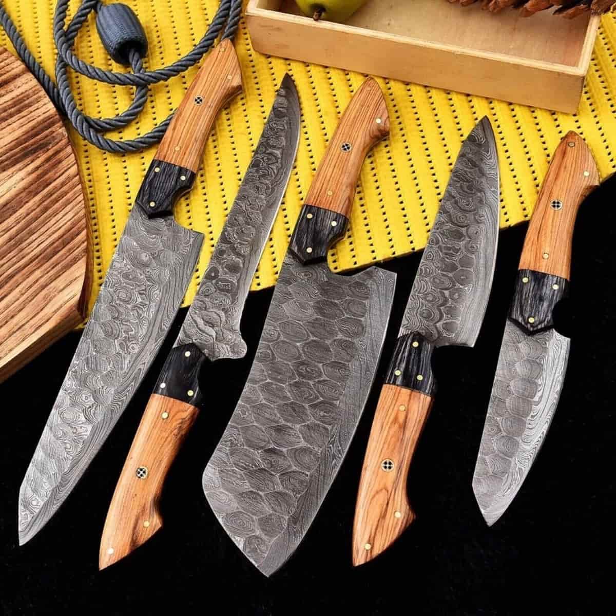 Decorative pin details on walnut-tone chef knife handles