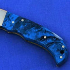 6.5-inch handmade twist Damascus folding knife with coloured wood handle and sheath – view 2